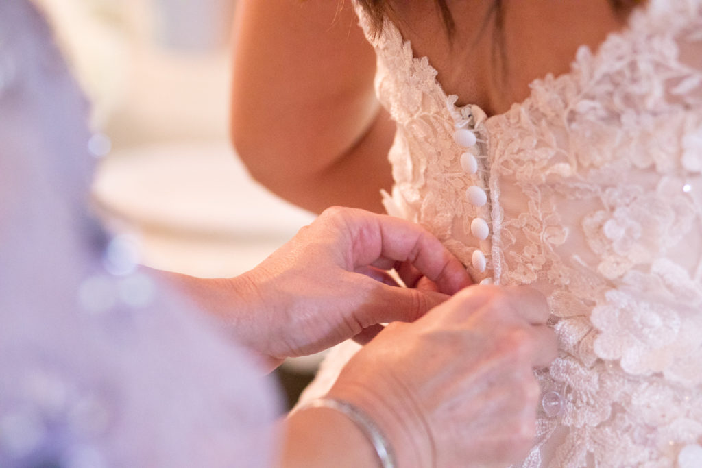 bride and mother getting ready
